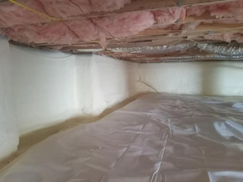Crawl space encapsulation with closed-cell spray foam for Roof Waterproofing in Oak Island
